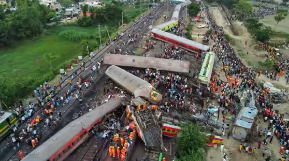 India blames train crash on signal failure as death toll nears 300