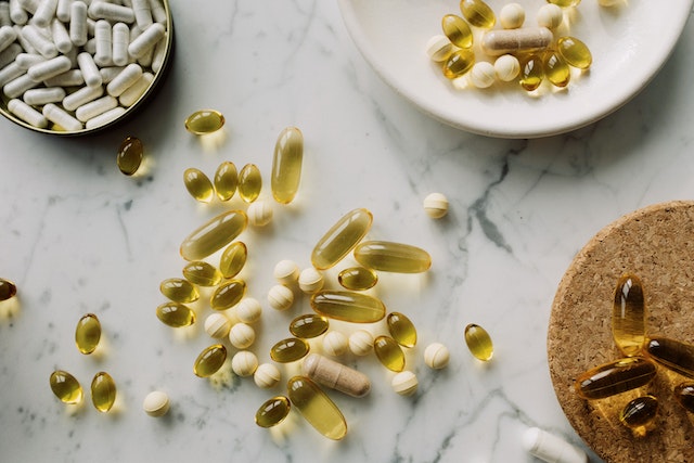 Unveiling the Benefits and Risks of Dietary Supplements