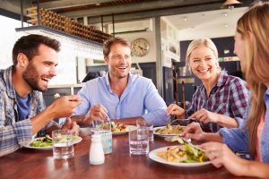 Group of friends eating at a restaurant