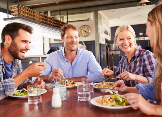 Group of friends eating at a restaurant